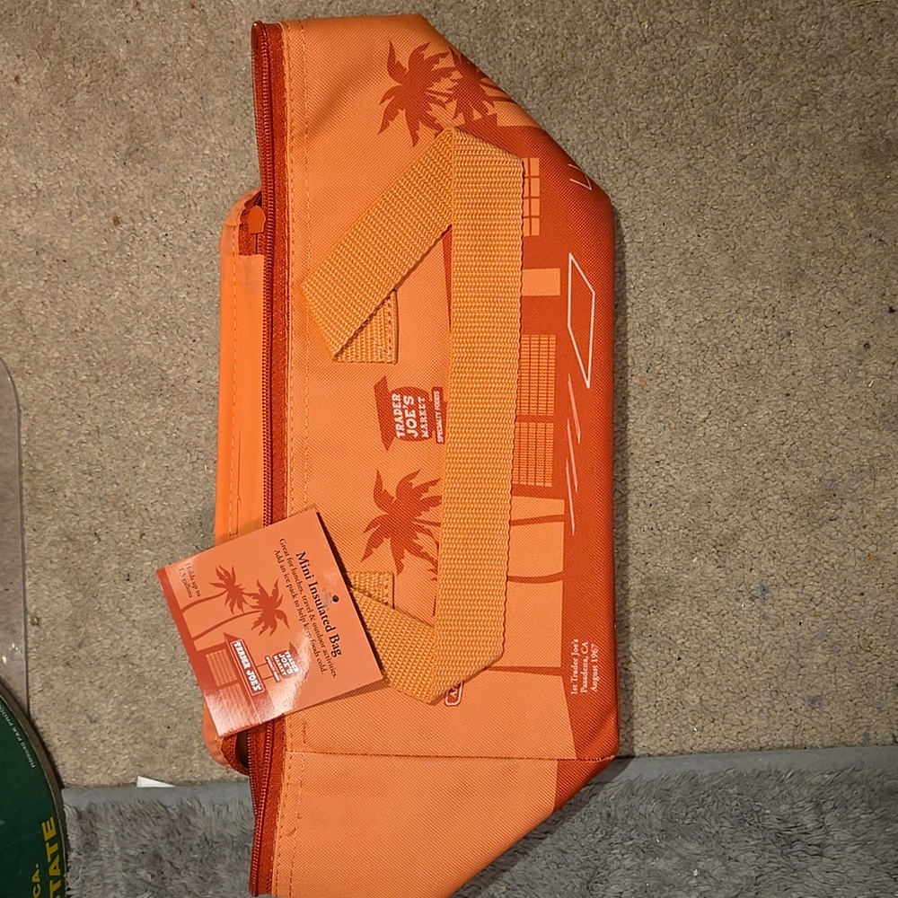 New With Tags. Trader Joe's Peach Mini Insulated Bag. Has Not Been Used.